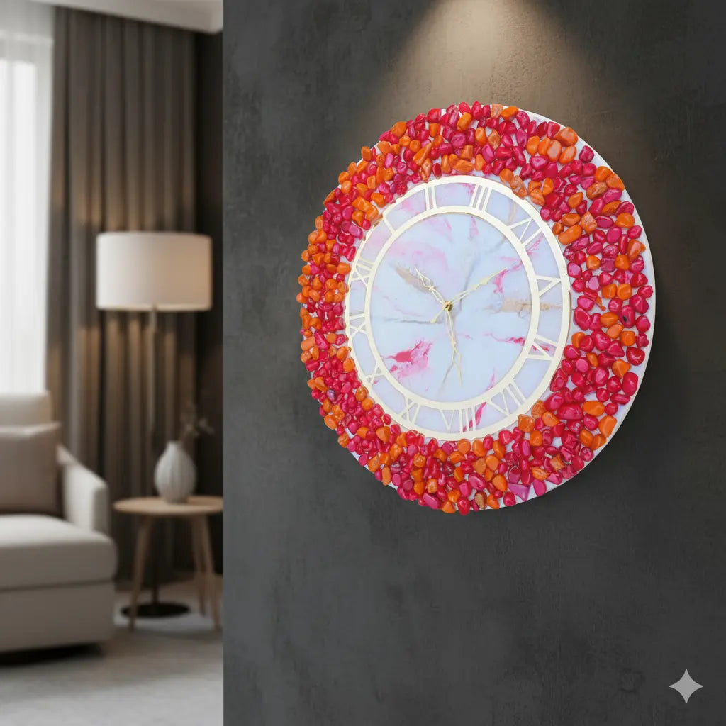Nandak Decors decorative wall clock with pink and orange pebble design in a room setting.