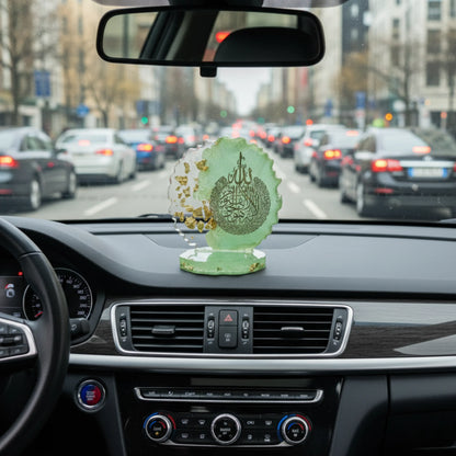 A decorative car dashboard showpiece on a car dashboard with a city street in the background by Nandak Decors 