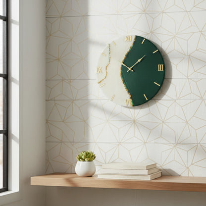 Green designer wall clock on a geometric-patterned wall with a shelf below