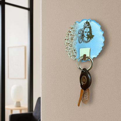 Premium resin art key rack showcasing a serene Siva idol, blending sacred artistry with practical home utility.
