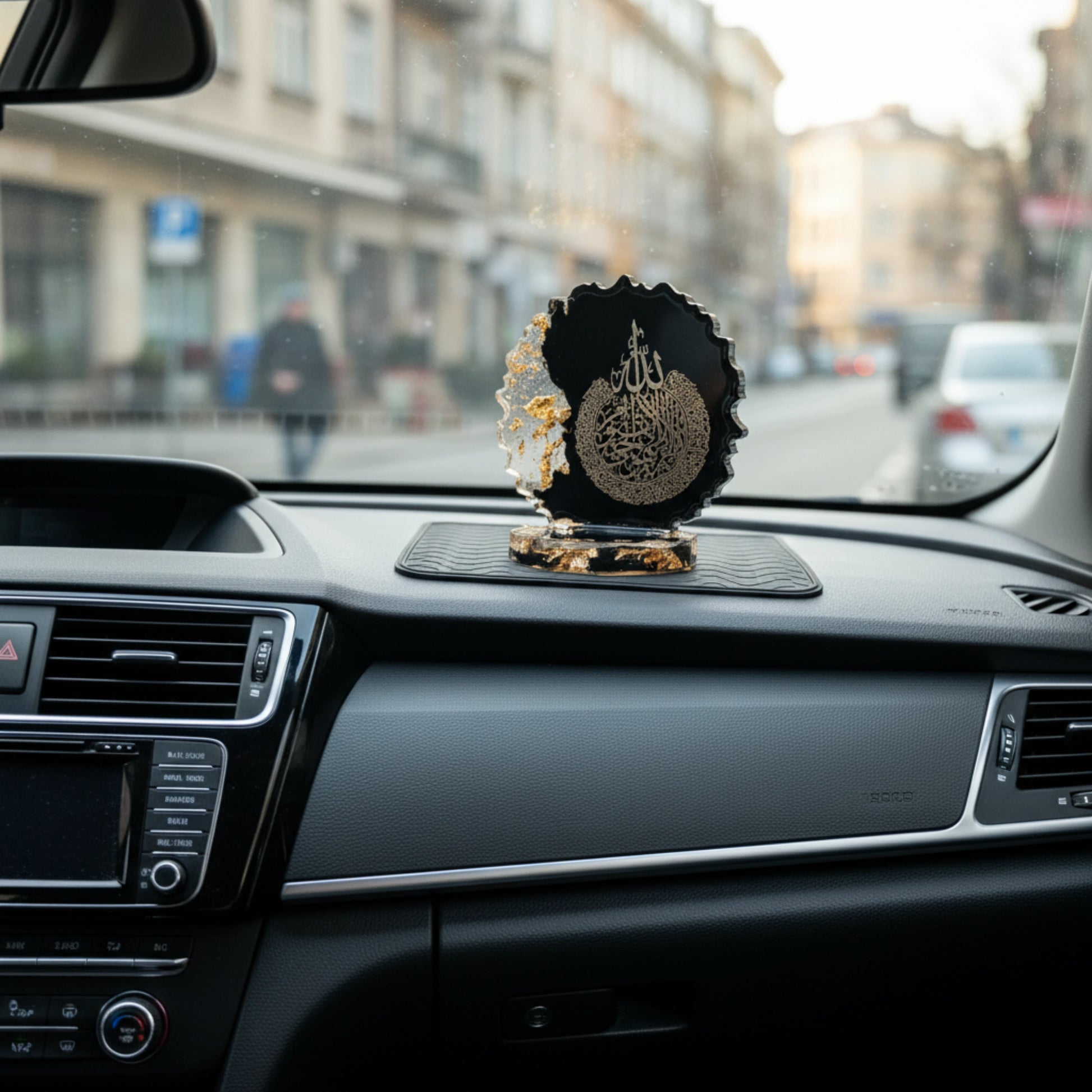 Decorative car dashboard showpiece on a car dashboard with a city street in the background by Nandak Decors 