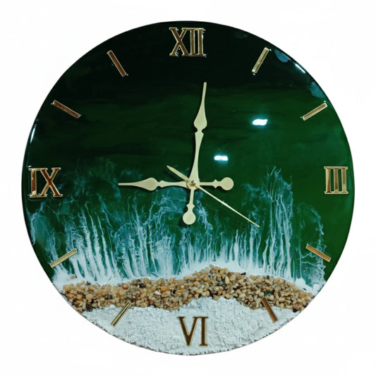 Premium handcrafted green ocean theme Resin Art Clock with realistic wave effects, natural beach stones, and white sandy texture at the bottom. The Resin Clock features elegant golden Roman numerals and designer gold hands, making it a luxury Modern Wall Clock for Living Room décor. This unique wall clock from Nandak Decors enhances interior spaces with coastal aesthetics and high-gloss resin finishing