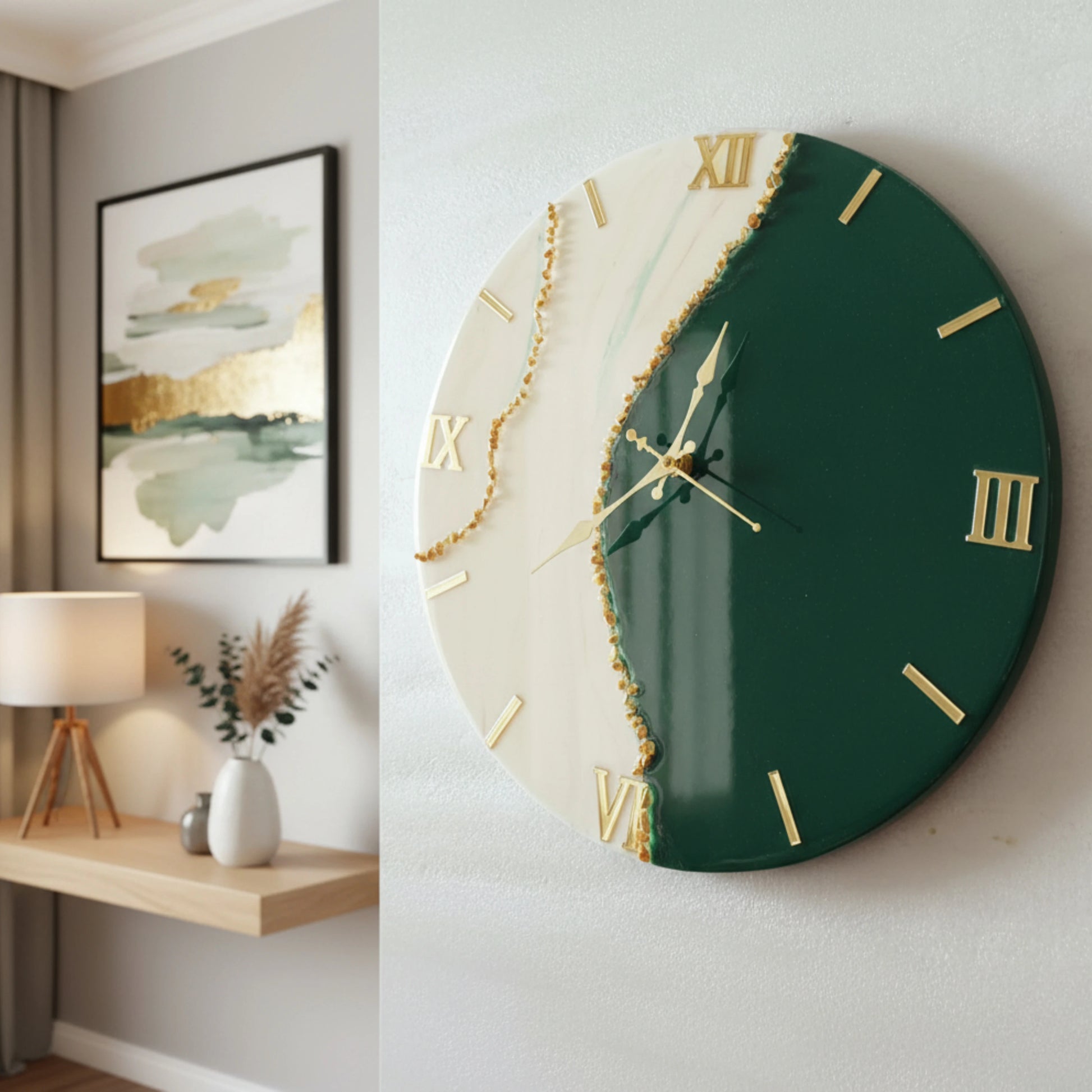 Green designer wall clock with gold accents on a white wall, with a shelf and lamp in the background.